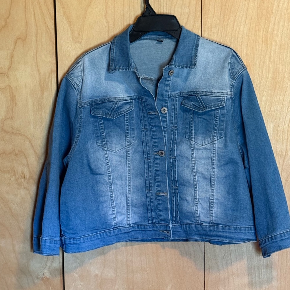 Denim jacket, light weight, 3/4 length sleeves. never worn